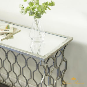 Mesa de consola de hierro texturizado moderna y top de vidrio